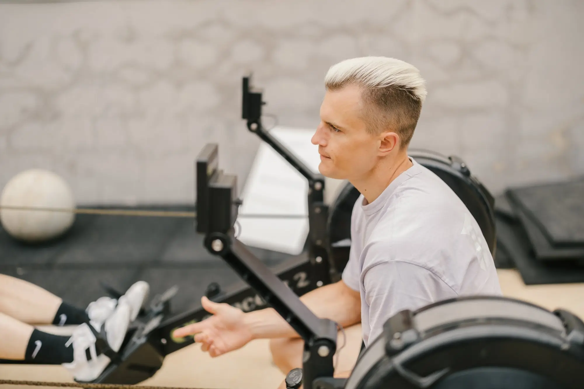 TRUE coach explaining rowing technique to an athlete